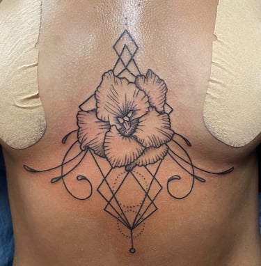 Graphic tattoo flowe with lines and circles