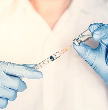 a doctor filling a syringe