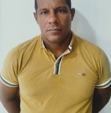 a man in a yellow shirt and a white shirt