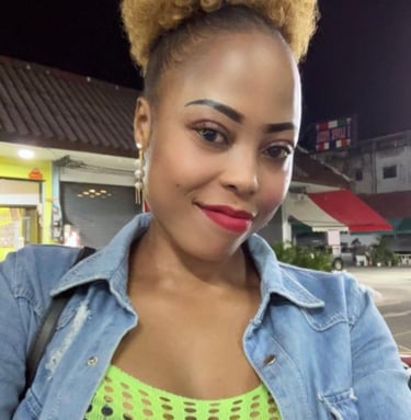 lady wearing green top and denim jacket