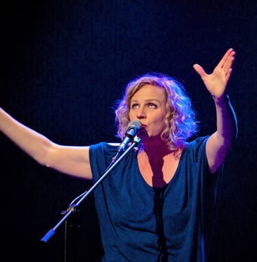 a woman in a black and white photo of a microphone and a microphone