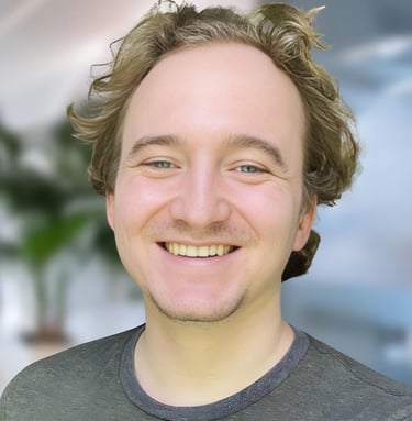 a man with a beard and a beard smiling