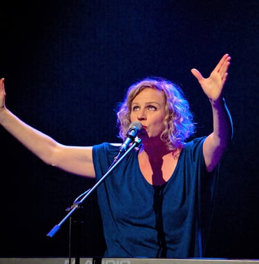 a woman in a black and white photo of a microphone and a microphone