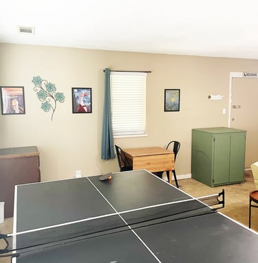 a ping pong table in game room