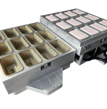 a food warmer with a tray of food inside