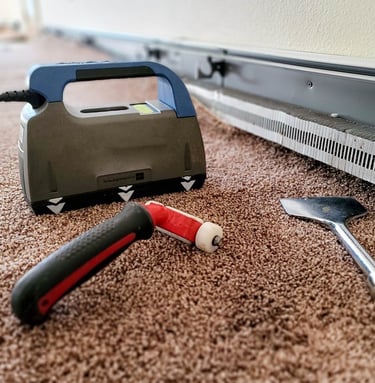 carpet repair tools on repaired carpet