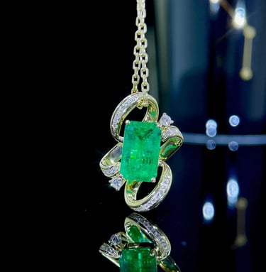 Emerald and Diamond Ribbon Pendant in 18k Yellow Gold