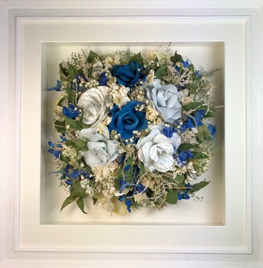 Birdseye view preserved wedding bouquet with faux paper flowers in a frame