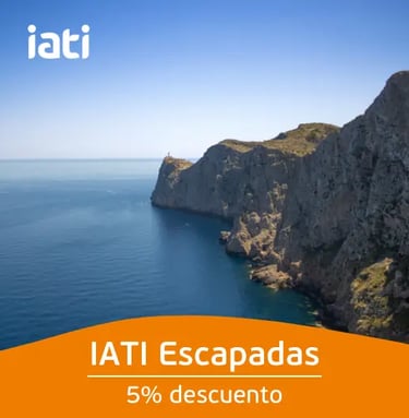 Scenic coastal cliffs over blue ocean for IATI Escapadas travel insurance discount.