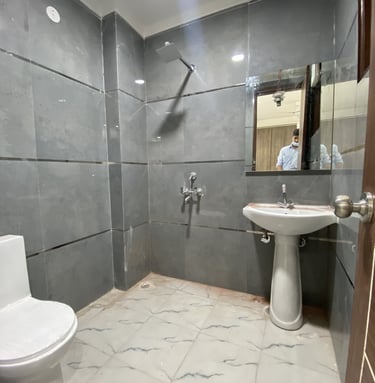 Designer Bathroom of 3 BHK Corner Builder Floor with Multiple Balconies — Chattarpur
