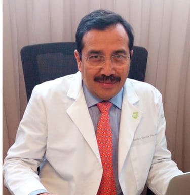 a man in a white lab coat and a laptop