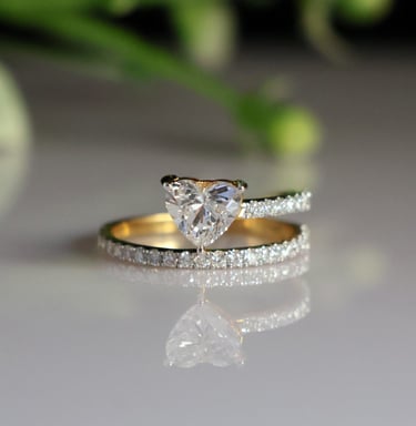 a Lab-Grown Diamonds ring with a heart shaped lab created diamond