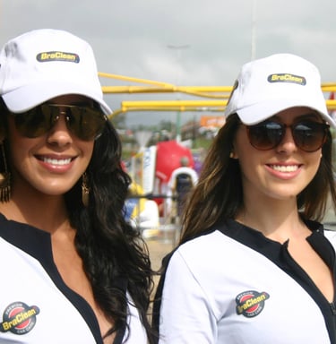 two women in white shirts and black sunglasses