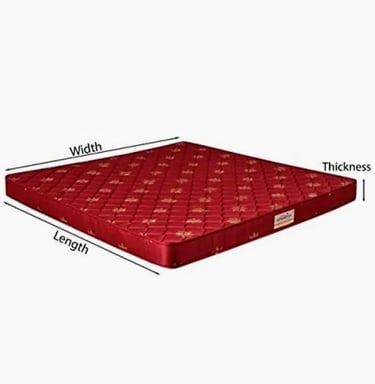 a mattress with a red coverlet and a white background