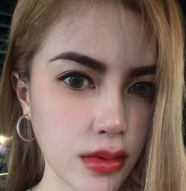 face and shoulder shot of lady with red lipstick