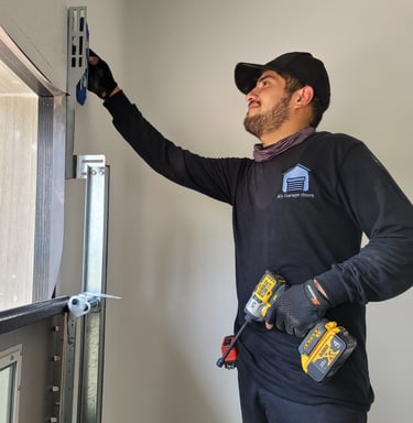 Alejandro upgrading a garage door | On Point Overhead Doors - Kyle, TX