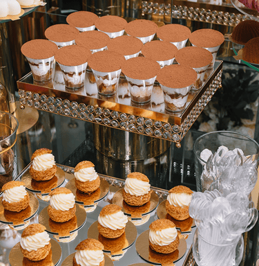 a table with a variety of desserts and desserts