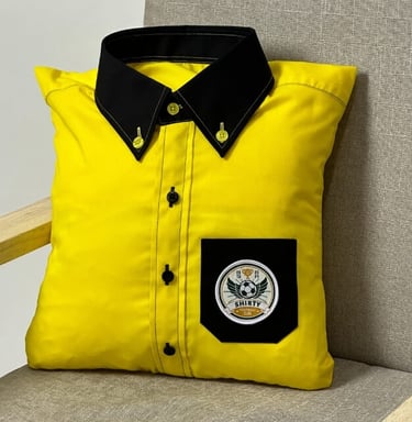 a yellow pillow designed as shirt with black collar and pocket