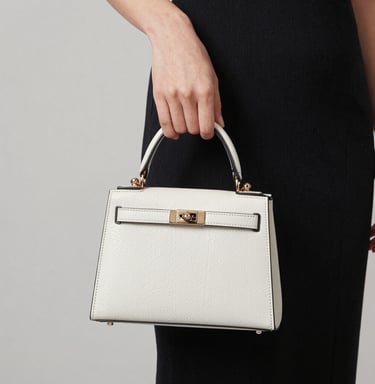 A selection of trendy handbags displayed on a modern shelf with soft lighting.