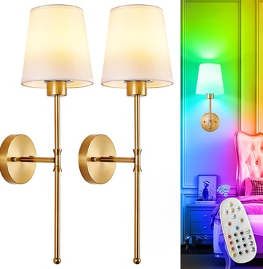 Set of two gold wall sconces with fabric shades and RGB color changing LED bulbs for bedroom lighting.