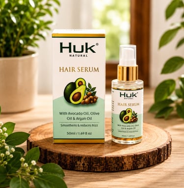 Huk Natural hair serum bottle and box with avocado oil, olive oil, and argan oil for frizz reduction.