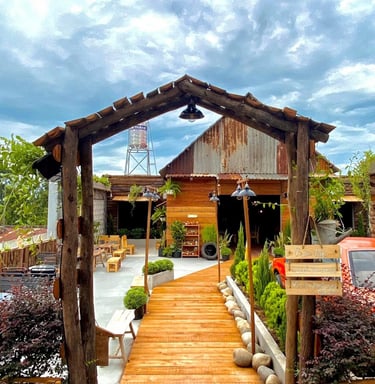 a wooden walkway leading to a wooden walkway