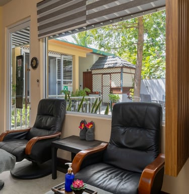 a living room with a view of a bathroom
