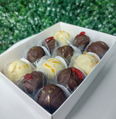 trufas de chocolate, frutas vermelhas, limão siciliano e rum