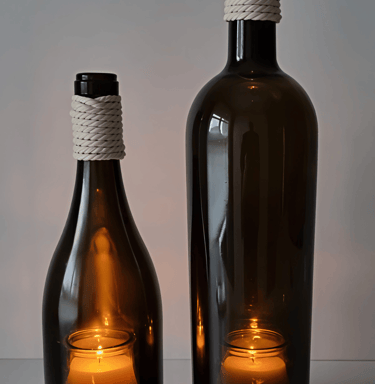 botella reciclada con vela