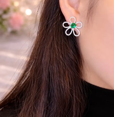 emerald and diamond flower earrings in white gold