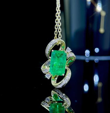 Emerald and Diamond Ribbon Pendant in 18k Yellow Gold