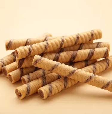 Variedad de barquillos, galletas y obleas para degustar con un cafe o de postre
