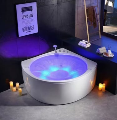 a bathtub with candles and candles on a table