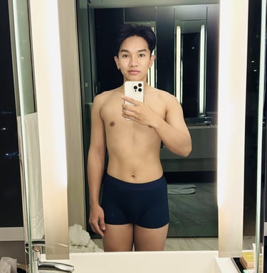 a man taking a photo while looking into a mirror