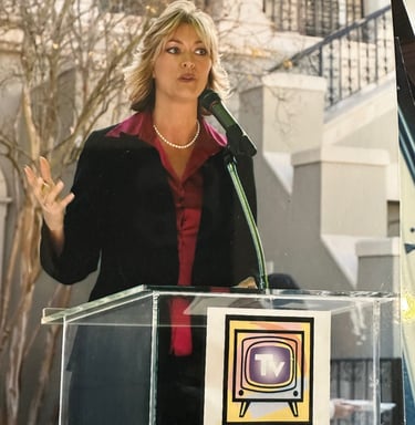Angie Crouch speaking at Luncheon