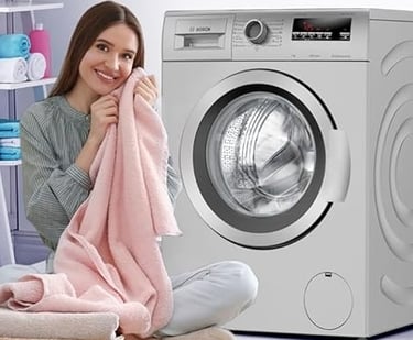 a woman sitting on a chair in front of a washing machine