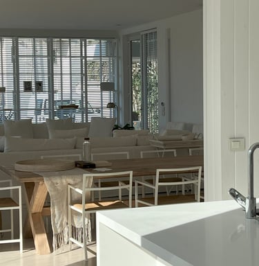 a kitchen with a sink, a sink, and a sink