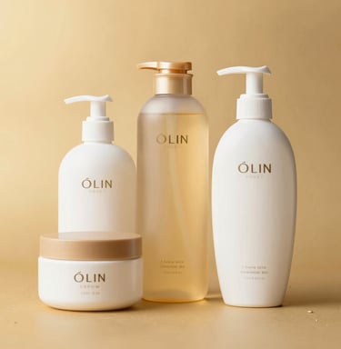 Luxurious hair care products displayed next to fresh flowers and a mirror.