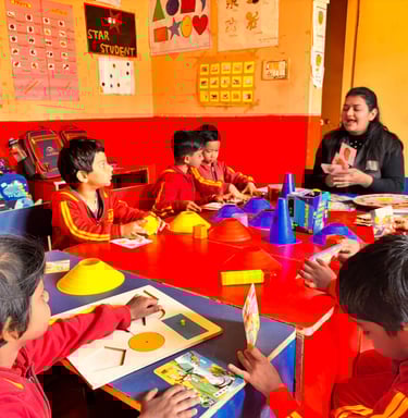 Preschool children and teacher engage in interactive learning activities with educational puzzles and games in a classroom.