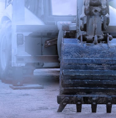 "Excavator construction equipment on concrete worksite with heavy machinery"