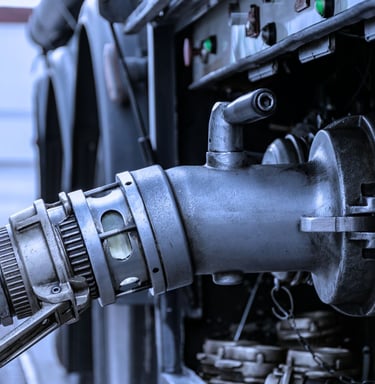 "Industrial hydraulic cylinder machinery with metal fittings and mechanical components"