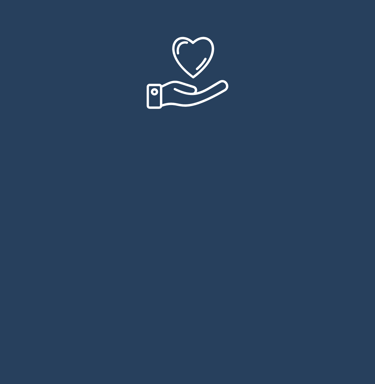 a hand holding a heart shaped object