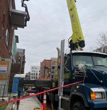a crane truck with a crane on it's side