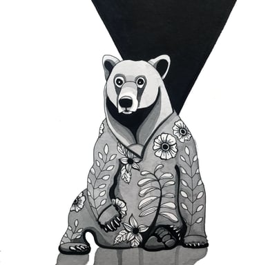 a bear in pjs with a black and white background