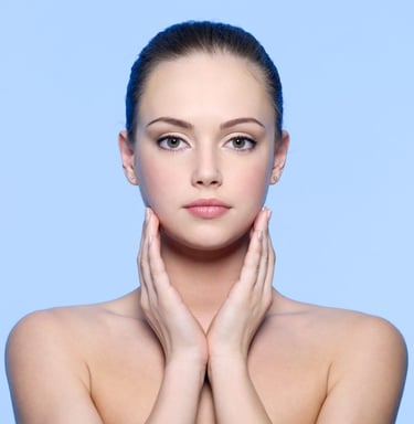 portrait of beautiful young woman with perfect skin