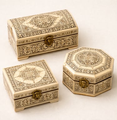 Camel bone jewelry boxes with intricate inlay patterns and carved detailing.