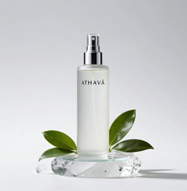 A minimalist black and gold perfume bottle standing tall against a crisp white background, reflecting timeless luxury.