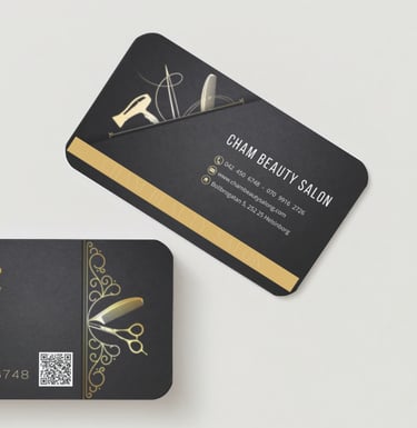 a business card with scissors and scissors on it