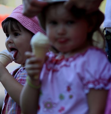 A child enjoying ZAKS Pud Pod's whippy ice cream at a ice cream van party hire