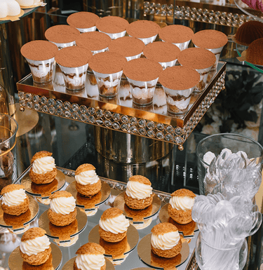 a table with a variety of desserts and desserts